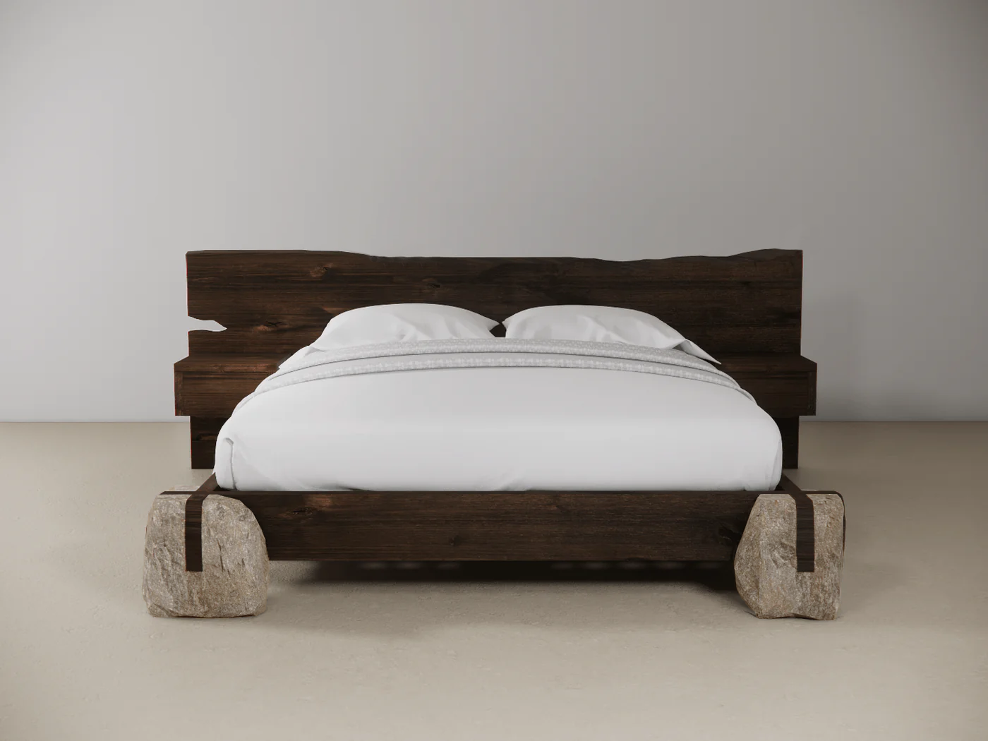 Wooden bed with stone bases in a plain setting