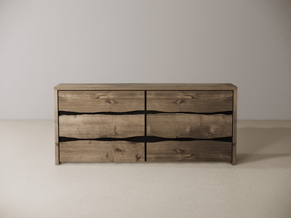 Wooden dresser with six drawers on a neutral background 