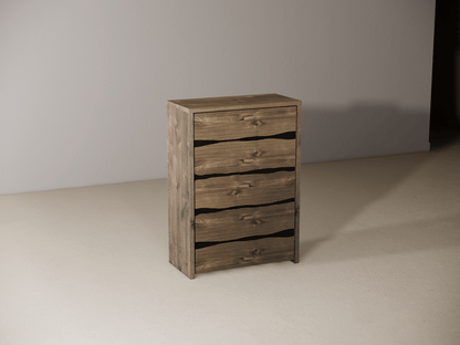 Wooden dresser with five drawers against a plain wall. 